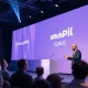Astro Teller speaking at StockPil Disrupt 2025 conference about innovation and moonshot thinking