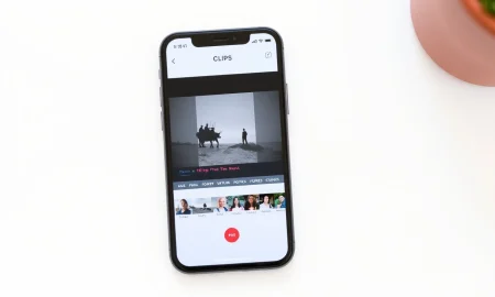 Apple Clips app interface showing video editing features on iPhone screen