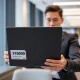 Professional using affordable Lenovo business laptop from Walmart $500 deal