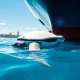 Autonomous hull cleaning robot removing biofouling from ship to reduce fuel consumption and emissions
