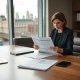 Chancellor Rachel Reeves reviewing non-dom tax overhaul impact assessment documents in government office