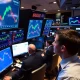 Professional analysis of US major indices experiencing a slight market dip on trading screens