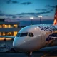 Allegiant Travel aircraft at airport gate during oversold stock conditions analysis