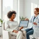 Amazon Health AI assistant consultation between patient and healthcare provider in modern medical setting