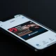 Apple Music app on a phone showing Ticketmaster concert listings and ticket links.