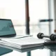 Legal documents on a desk with a fintech office in the background, representing Kalshi criminal charges.