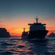 Cargo ship navigating the strategic Strait of Hormuz, illustrating Asia FX vulnerability to energy supply disruptions.