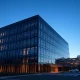 Modern Australian data center at dusk, representing the infrastructure for ASX AI stocks in 2026.