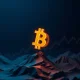 Bitcoin symbol poised above financial charts illustrating the critical support test and potential price drop.