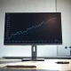 Analyst monitoring the BSV ETF price chart showing a significant surge, representing the $614 million bond market inflow.