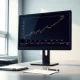 Analysis of CINF stock chart and dividend run strategy on a financial trading desk.