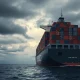 Cargo ship at sea representing global coffee trade and shipping disruption.
