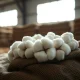 Close-up of cotton bolls representing mixed closing prices and USDA export data for March 2026.