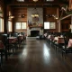 Empty Cracker Barrel dining room illustrating the ongoing sales and traffic slump after a failed rebrand.