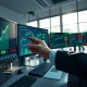 Financial analyst monitoring U.S. dollar and Treasury yield data on trading floor screens in March 2026.