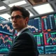Financial analyst monitors falling US dollar index DXY chart after weak payroll report impacts currency markets.