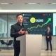 Elon Musk announces X Money launch with Dogecoin price surge in background.