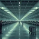 Empty airport terminal concourse after mass flight cancellations.