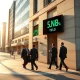FNB Corp stock ticker showing 3% dividend yield on financial district display
