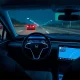 Ford BlueCruise dashboard interface showing navigation screen during nighttime highway driving