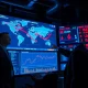 G7 emergency oil reserve release talks as energy analyst monitors surging crude prices in strategic facility control room