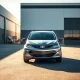 2027 Chevy Bolt EV outside GM's Fairfax Assembly Plant, symbolizing the model's strategic revival.