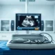 Hologic's MyoSure system and minimally invasive surgical instruments in an operating room, representing GYN surgical strength.