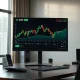 A stock chart for Arm Holdings on a financial trading desk monitor.