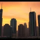 A city skyline representing the international financial institutions threatened by Iran's recent statement.