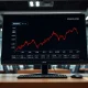 Breaking news on IYW ETF outflows affecting CRM, APH, and QCOM stock prices.