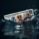 Japanese Yen banknote struggling in turbulent water, symbolizing BoJ policy uncertainty and market volatility.