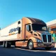 J.B. Hunt Transport Services truck at a logistics hub, representing the company reaching its analyst stock price target.