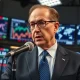 Larry Kudlow delivering investment advice on post-war economic prosperity during a news broadcast.