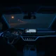 Lucid Gravity SUV dashboard showing Apple CarPlay interface on central touchscreen during software update rollout.