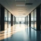 Empty office hallway at a tech company representing potential Meta layoffs and restructuring.