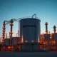 Methanol production plant at dusk representing Methanex industrial operations and stock surge analysis.