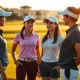 Michelle Wie West launches Power Her Drive mentorship with Ford for LPGA Tour rookies on a golf course.