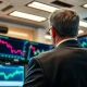 Traders monitor natural gas price movements on a financial trading floor.