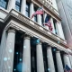 New York Stock Exchange building with a digital blockchain overlay representing the new tokenized securities platform.