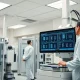 Automated pharmacy robotics system in a hospital setting representing Omnicell technology.