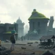 Pokémon Pokopia game scene showing Ditto trainer and Charmander in restored post-apocalyptic habitat