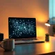 Rox AI sales automation platform with AI agents managing CRM data and customer insights on a laptop in a modern office.