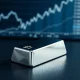 Silver bullion bar representing the surge in silver price forecast and safe-haven demand ahead of US NFP data.