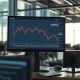 Stepan Co. SCL stock chart showing oversold technical indicators on trading monitor