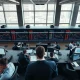 Trading floor monitors showing stock market gains and falling oil prices on March 16, 2026.