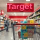 Target store aisle showing grocery items with price cut tags as inflation remains high.