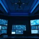 Modern military command center with digital screens representing Anduril's defense technology.