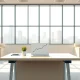 US layoff announcements data showing a downward trend on a desk in a professional office setting.