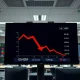 UVXY ETF outflow data visualization showing $42 million capital movement on trading floor monitor