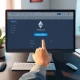 Vitalik Buterin's vision for one-click Ethereum staking simplifies crypto participation.